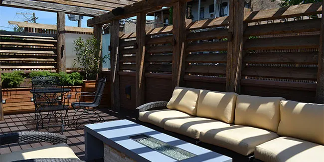 Rooftop view showing the pergola structure and landscaping